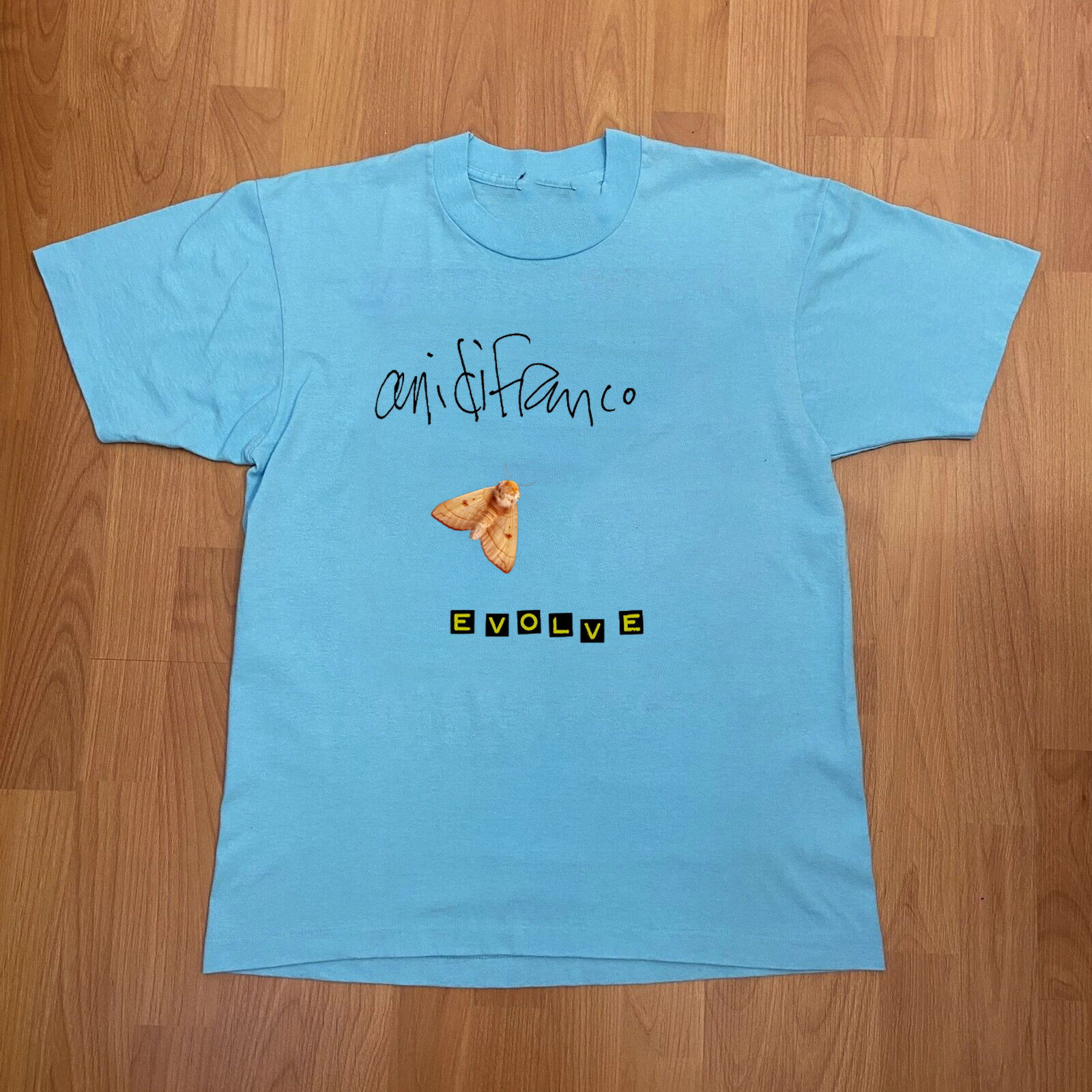 Evolve – Ani DiFranco Light Blue Cotton Shirt Full size S-5XL T613